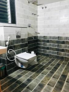 Koupelna v ubytování Sharada Residency