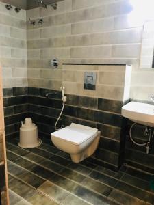 Koupelna v ubytování Sharada Residency