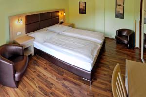Letto o letti in una camera di Hotel Tannenhof