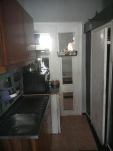 Kuchyň nebo kuchyňský kout v ubytování Central, nice and clean apartment! ~Sitia~