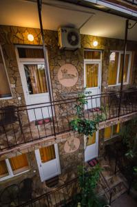 an overhead view of a building with a balcony at Гостевой дом Рыжий Кот (Людмила) in Alushta