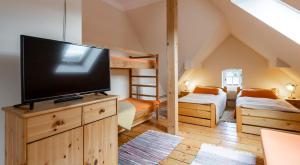 Postel nebo postele na pokoji v ubytování Vila Josefina Jizerské hory + 52 fotografií