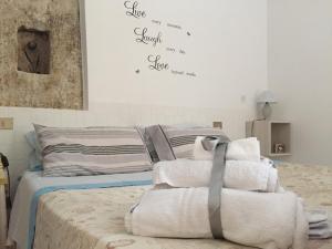 Postel nebo postele na pokoji v ubytování B&B Dell'Annunziata