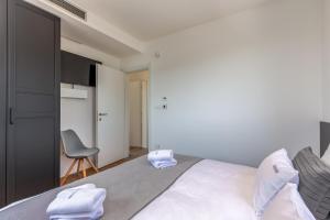 Postel nebo postele na pokoji v ubytování Luxury Villa Quadra