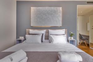 Postel nebo postele na pokoji v ubytování Luxury Villa Quadra