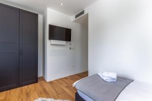 TV a/nebo společenská místnost v ubytování Luxury Villa Quadra