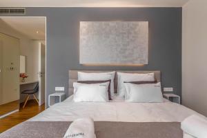 Postel nebo postele na pokoji v ubytování Luxury Villa Quadra