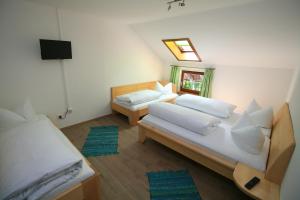 Ένα ή περισσότερα κρεβάτια σε δωμάτιο στο Landgasthof Auerschmiede