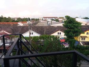 a view of a city from a balcony at 8 SLEEPER STREET Hostel in Krabi