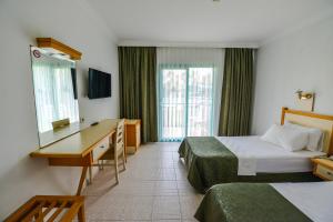 TV a/nebo společenská místnost v ubytování Rebin Beach Hotel