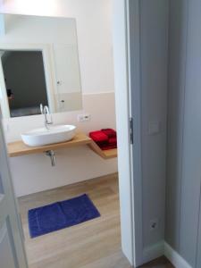 Koupelna v ubytování Haus Svenja + 18 fotografií