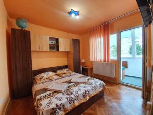 Postel nebo postele na pokoji v ubytování Apartament Maya