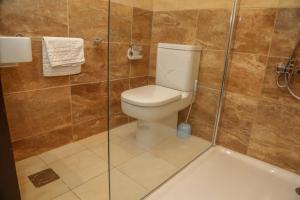 Ein Badezimmer in der Unterkunft Riviera Taouyah Hotel