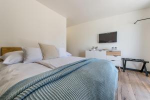 Postel nebo postele na pokoji v ubytování Sofia Boutique Hotel