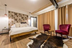 Postel nebo postele na pokoji v ubytování Sofia Boutique Hotel