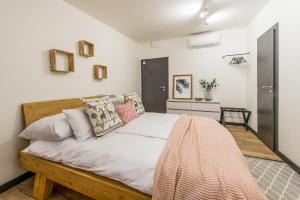 Postel nebo postele na pokoji v ubytování Sofia Boutique Hotel