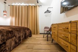 Postel nebo postele na pokoji v ubytování Sofia Boutique Hotel