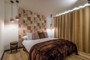 Postel nebo postele na pokoji v ubytování Sofia Boutique Hotel