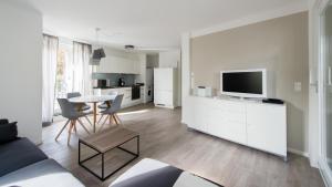 Kuchyň nebo kuchyňský kout v ubytování Ferienwohnung Wilhelmstraße + 8 fotografií