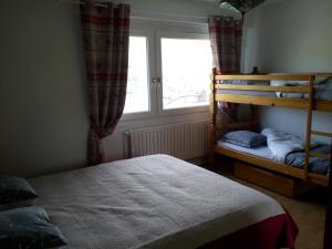 Säng eller sängar i ett rum på Bellavie - Maison d'hôtes