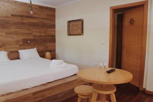 Ένα ή περισσότερα κρεβάτια σε δωμάτιο στο Oportocean Suites
