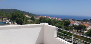 a view from the balcony of a house at Hvar De Luxe Apartments in Hvar