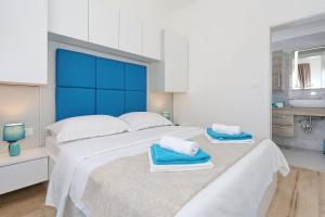 Ένα ή περισσότερα κρεβάτια σε δωμάτιο στο Punta Garden Pool House +38 φωτογραφίες