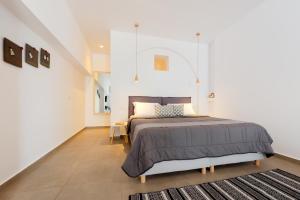 Voodi või voodid majutusasutuse Sigalas Beach Hotel toas