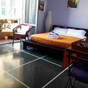 A bed or beds in a room at Il Riposo del Guerriero Guesthouse