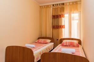 Postel nebo postele na pokoji v ubytování Guesthouse Casa Barbaro