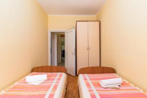Postel nebo postele na pokoji v ubytování Guesthouse Casa Barbaro