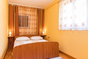 Postel nebo postele na pokoji v ubytování Guesthouse Casa Barbaro