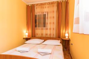 Postel nebo postele na pokoji v ubytování Guesthouse Casa Barbaro