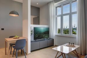 Telewizja i/lub zestaw kina domowego w obiekcie Lifestyle Apartments