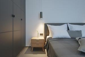 Łóżko lub łóżka w pokoju w obiekcie Lifestyle Apartments