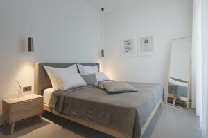 Łóżko lub łóżka w pokoju w obiekcie Lifestyle Apartments