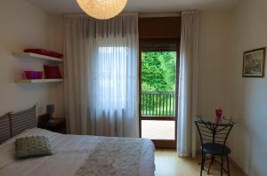 Postel nebo postele na pokoji v ubytování B&B Piccole Dolomiti