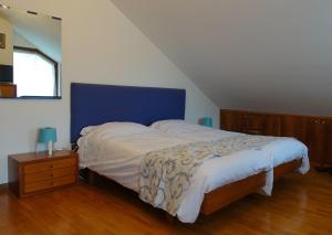 Postel nebo postele na pokoji v ubytování B&B Piccole Dolomiti