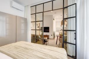 Łóżko lub łóżka w pokoju w obiekcie Lifestyle Apartments