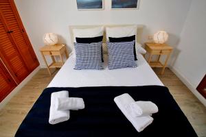 Letto o letti in una camera di LightHouse View I
