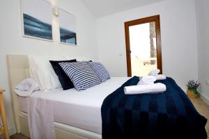 Letto o letti in una camera di LightHouse View I