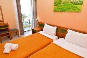 Voodi või voodid majutusasutuse Costa Hotel toas