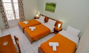 Voodi või voodid majutusasutuse Costa Hotel toas