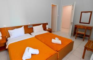 Voodi või voodid majutusasutuse Costa Hotel toas