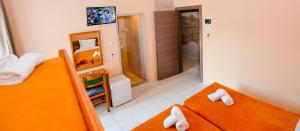 Voodi või voodid majutusasutuse Costa Hotel toas
