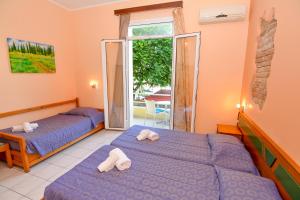 Voodi või voodid majutusasutuse Costa Hotel toas