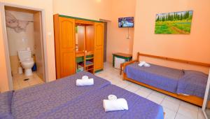 Voodi või voodid majutusasutuse Costa Hotel toas