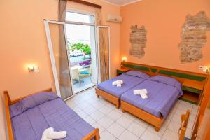 Voodi või voodid majutusasutuse Costa Hotel toas