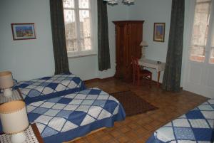 A bed or beds in a room at B&B CasettAzzurri