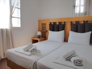 Cama ou camas em um quarto em Chaniotis Studios